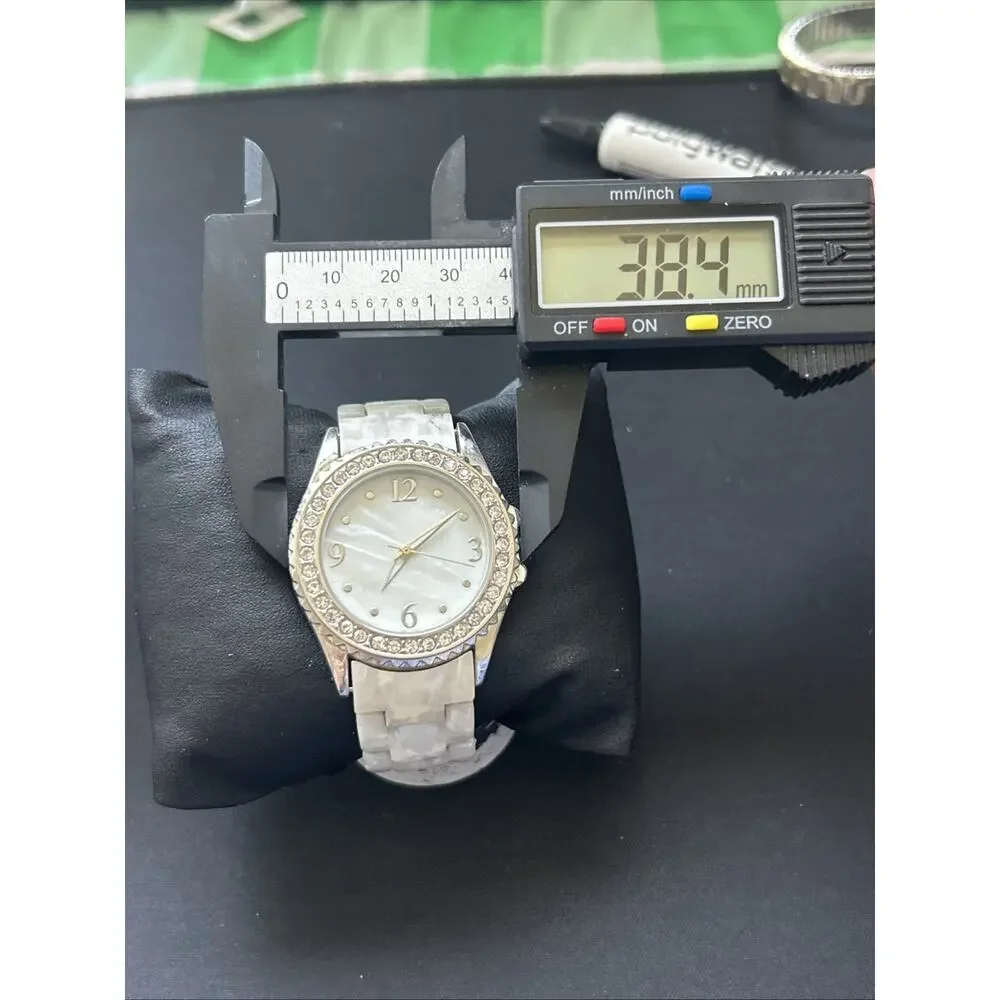 MOP Dial Silver Tone Case Women’s Quartz Watch